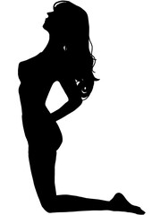 腰を反らしている女性のシルエット