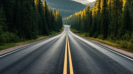 Fototapeta premium Long open road through a forest with mountain background, perfect for travel and adventure themes. Beautiful scenic drive in nature.
