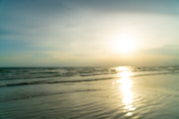 abstract blur beautiful sea beach with sunset time for background