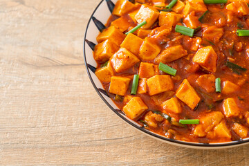 Mapo Tofu - The traditional Sichuan dish of silken tofu and ground beef, packed with mala flavor from chili oil and Sichuan peppercorns.