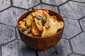 Thai red spicy curry with chicken