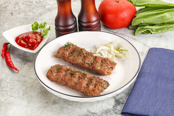 Kebab with beef served onion