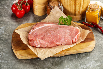 Raw pork schnitzel for cooking