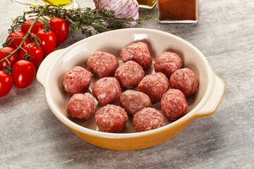 Uncooked raw beef meatball minced
