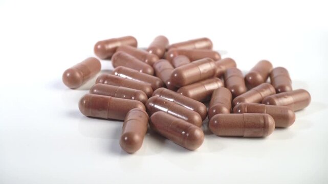 
Green tea capsules isolated - EGCG supplement as herbal antioxidant
