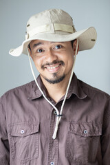 Samart executive camping man with advaenture hat on white background