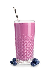 Glass of fresh blueberry smoothie and berries on white background