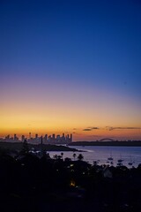 Fototapeta premium aerial cityscape view of sydney skyline in golden hour dusk sky over sdyney harbour