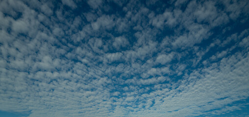 Summer clouds. Cloudy sky. Vivid cyan blue sky with clouds in environment day horizon skyline view. White clouds on soft sky background. White cloudy sky.