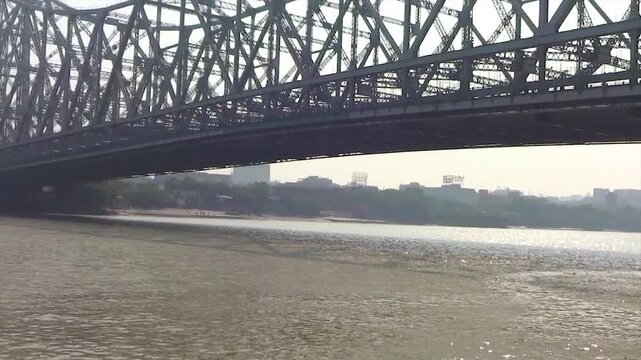 Breathtaking view of Howrah Bridge (Rabindra Setu) from Hooghly river.