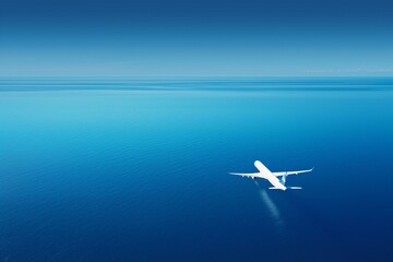 airplane flying over the sea