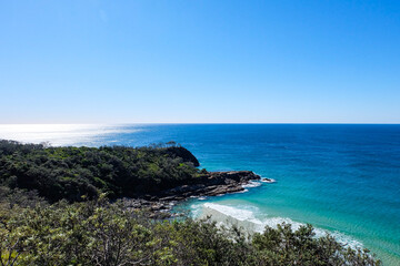 Noosa National Park, Coastal Walk, hike along the stunning blue sea and ocean on a beautiful sunny blue sky day, Sunshine Coast, Australia 