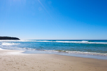 Noosa National Park, Coastal Walk, hike along the stunning blue sea and ocean on a beautiful sunny blue sky day, Sunshine Coast, Australia 