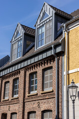 Obraz premium facade of a European house building with beautiful windows 