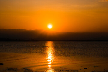 Sun Setting Over The Mountains