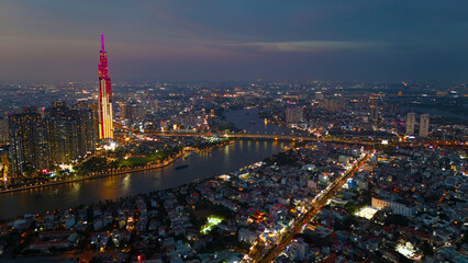 An aerial view of Ho Chi Minh City at sunset, vibrant colorful s