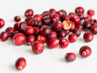 Fresh, ripe red currants and cranberries isolated on white background