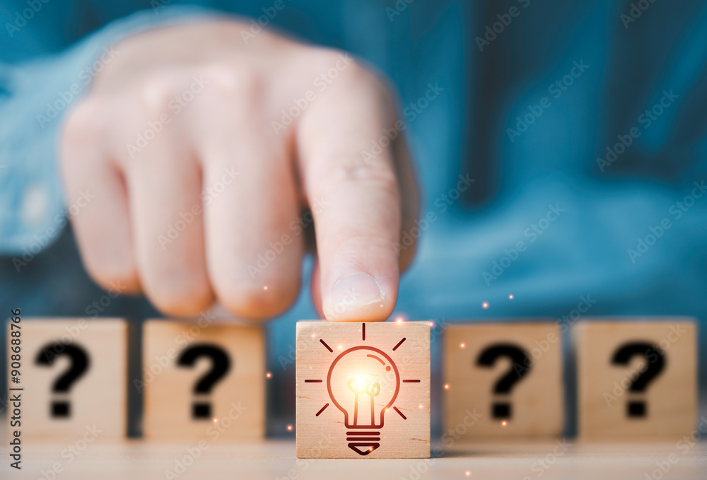 Poster hand touch and pushing glowing lightbulb in front of question mark for creative thinking innovation 