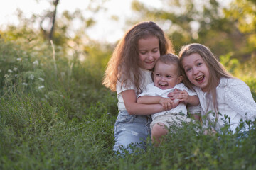 Joyful children are playing together outdoors, embracing the beauty of nature and friendship