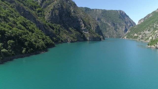 Aerial view of famous Piva Canyon with its fantastic reservoir