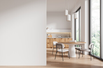 Modern kitchen interior with dining area and large windows. 3D Rendering