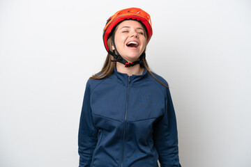 Young cyclist Lithuanian woman isolated on white background laughing