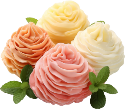 Colorful buttercream frosting roses in soft pink, peach, and cream shades, beautifully decorated with mint leaves.