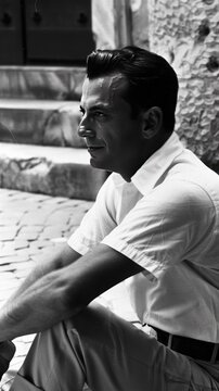 A relaxed summer afternoon in Rome, July 1963, featuring a charming man enjoying leisure, capturing the essence of carefree moments and the vibrant atmosphere of the city.