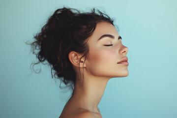 A close up of a girl's face with her eyes closed