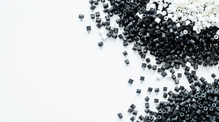 Obraz premium Top view of black and white polymer masterbatch granules, light background, industrial plastic template. Generative AI