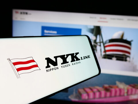 Stuttgart, Germany - 07-29-2024: Mobile phone with logo of company Nippon Yusen Kabushiki Kaisha (NYK Line) in front of business website. Focus on center-left of phone display.