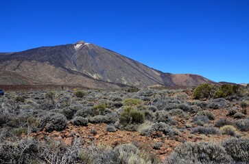 Scenic view of volcanic rock formations in desert during sunny day, Teide National Park, Tenerife