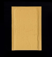Crumpled and creased vintage manila envelope back