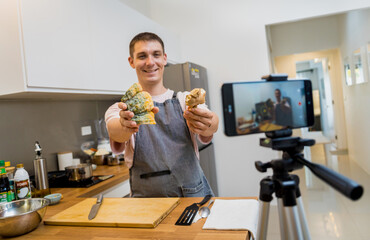 The chef is broadcasting live from workshop how to prepare a vegetarian food