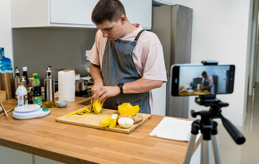 The chef is broadcasting live from workshop how to prepare a vegetarian food