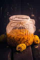 Sliced fruit quince jar covered sugar