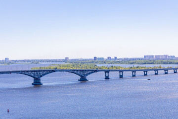 The bridge over the Volga River between the cities of Saratov and Engels, Russia. A sunny summer day.
