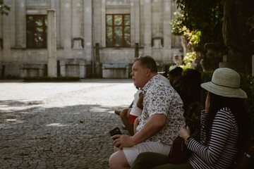 Historic urban vibes people enjoying a quiet moment outdoors