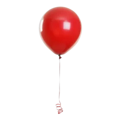 A red balloon is floating in the air