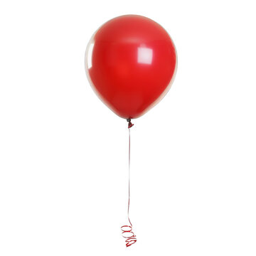 A red balloon is floating in the air