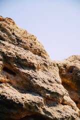 Rock. Sea. Stone texture. Rock texture. Seascape. Sunny weather. Sea rock. Stone in the middle of the sea. Wildlife. Sea nature