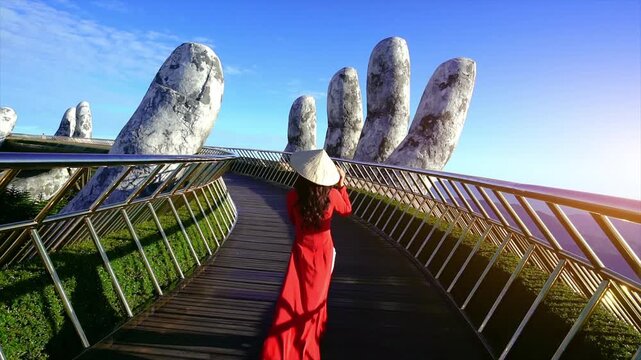 Tourist walking at Golden bridge in Bana hills, Da nang, Vietnam.
