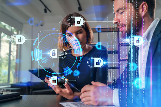Cybersecurity professionals analyzing data with digital lock graphics. - Powered by Adobe