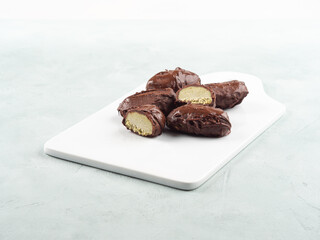 Chocolate coconut praline icecream bars with pistachio butter