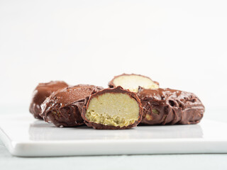 Chocolate coconut praline icecream bars with pistachio butter