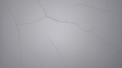 Small cracks on the white wall
