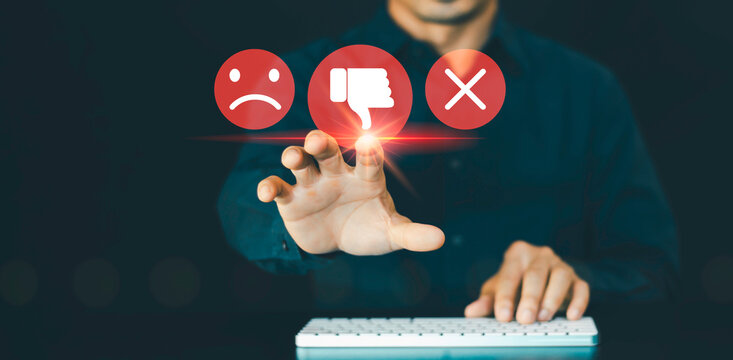 Hand of client show a feedback, thumb down, Service rating, negative review, dislike icon, reputation management, bad review comment, satisfaction concept