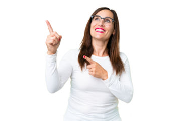 Middle age woman over isolated chroma key background pointing with the index finger a great idea