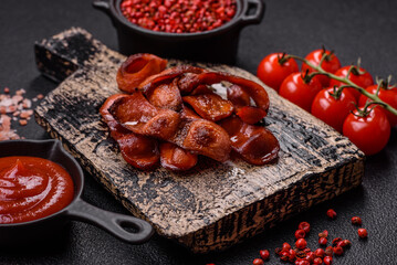 Fried sausages sliced with salt and spices as an ingredient for an English breakfast