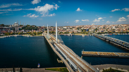 Istanbul Golden Horn bridge and city view. Views of mosques, blue sea and bridge. Halic, Istanbul, Turkey.